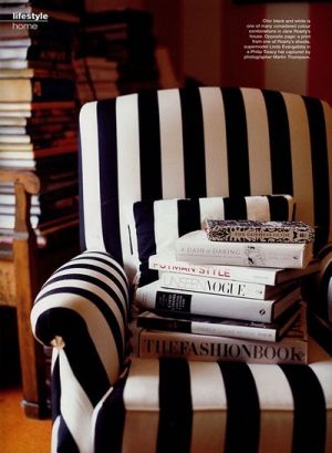 black and white chair with fashion books.jpg
